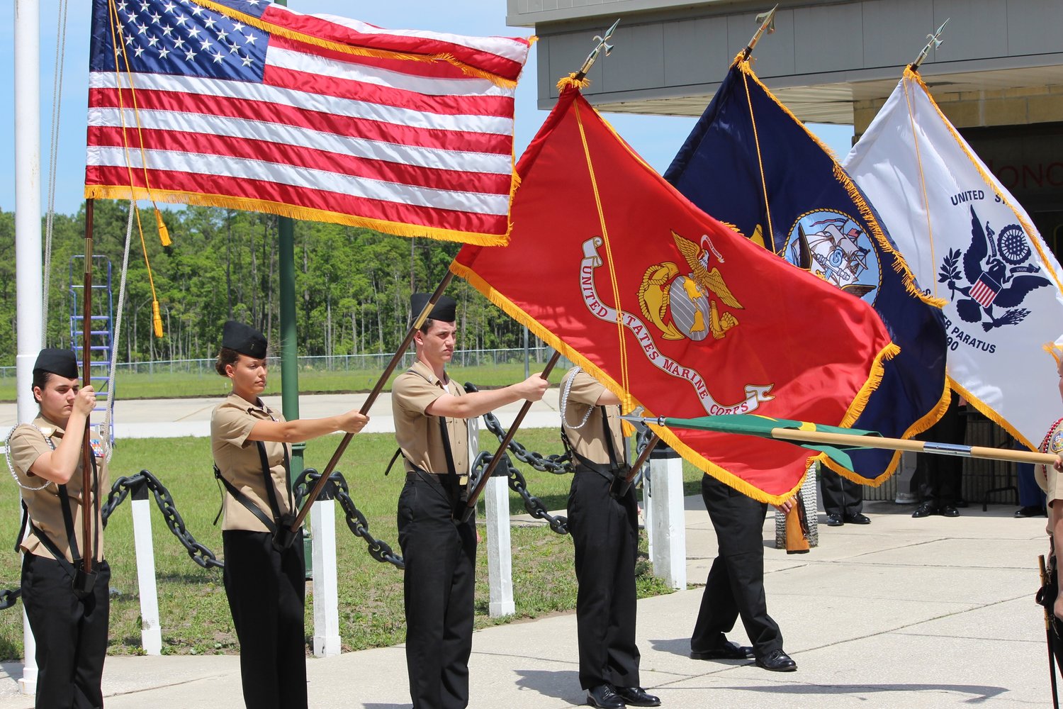 Nease NJROTC presents the colors during a unit promotions-and-awards ceremony.